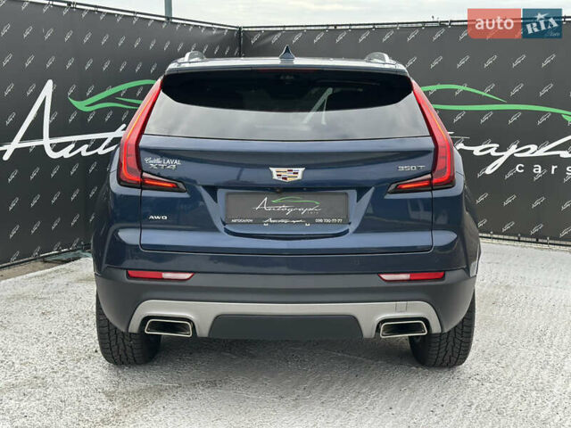 Синий Кадиллак XT4, объемом двигателя 2 л и пробегом 47 тыс. км за 26999 $, фото 3 на Automoto.ua