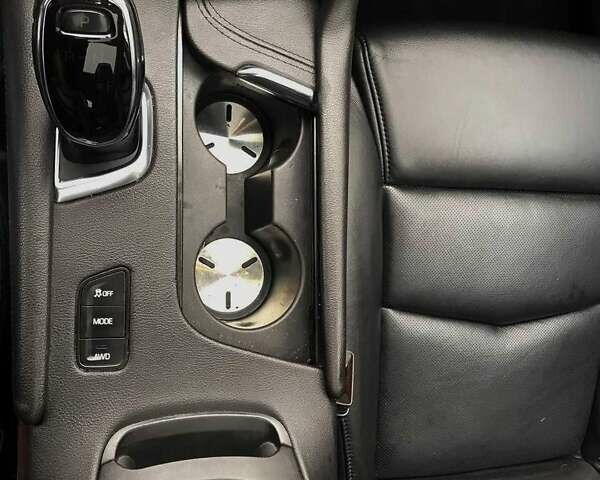 Чорний Каділак XT5, об'ємом двигуна 3.6 л та пробігом 183 тис. км за 17200 $, фото 9 на Automoto.ua