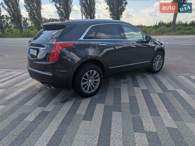 Черный Кадиллак XT5, объемом двигателя 3.6 л и пробегом 118 тыс. км за 17200 $, фото 1 на Automoto.ua