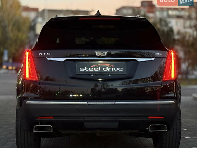 Чорний Каділак XT5, об'ємом двигуна 3.65 л та пробігом 175 тис. км за 21999 $, фото 3 на Automoto.ua