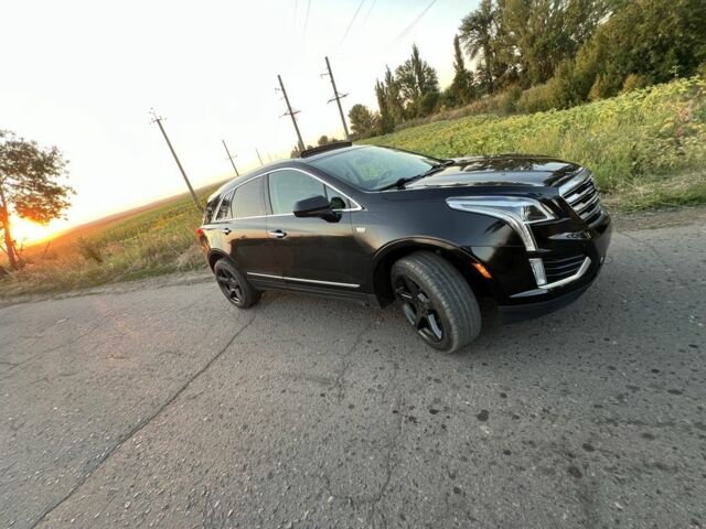 Чорний Каділак XT5, об'ємом двигуна 3.6 л та пробігом 120 тис. км за 18500 $, фото 1 на Automoto.ua