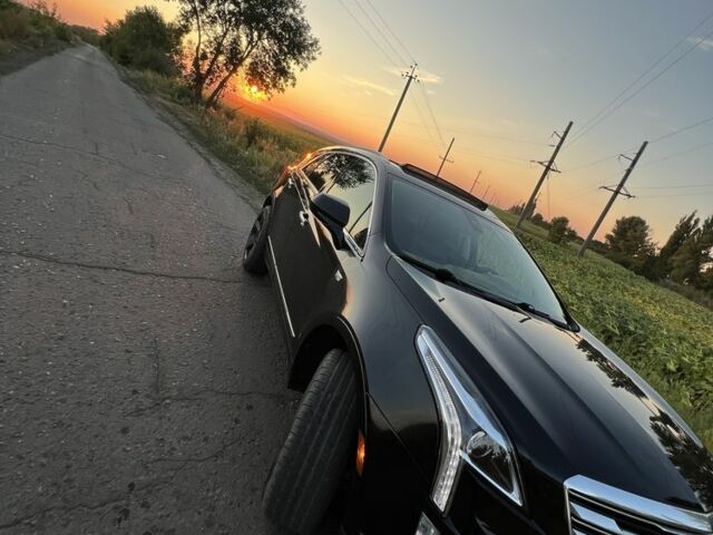 Чорний Каділак XT5, об'ємом двигуна 3.6 л та пробігом 120 тис. км за 18500 $, фото 6 на Automoto.ua