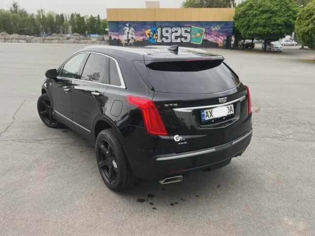 Чорний Каділак XT5, об'ємом двигуна 0.36 л та пробігом 90 тис. км за 23500 $, фото 2 на Automoto.ua