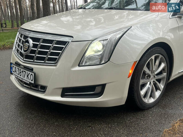 Белый Кадиллак ХТС, объемом двигателя 3.56 л и пробегом 130 тыс. км за 12000 $, фото 3 на Automoto.ua