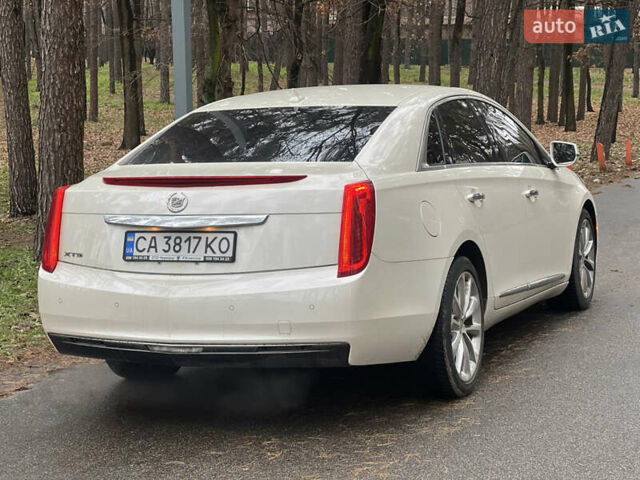 Белый Кадиллак ХТС, объемом двигателя 3.56 л и пробегом 130 тыс. км за 12000 $, фото 5 на Automoto.ua