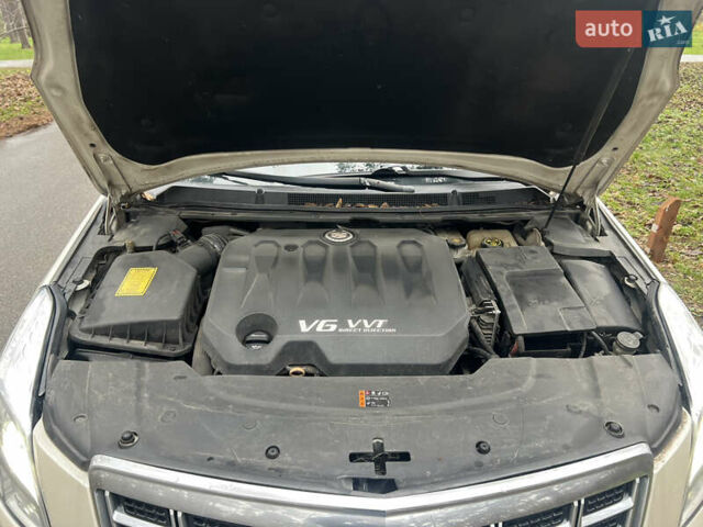 Белый Кадиллак ХТС, объемом двигателя 3.56 л и пробегом 130 тыс. км за 12000 $, фото 18 на Automoto.ua