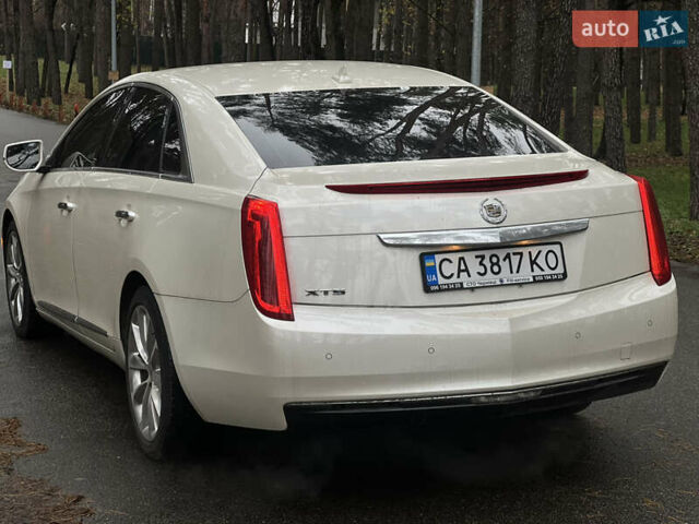 Белый Кадиллак ХТС, объемом двигателя 3.56 л и пробегом 130 тыс. км за 12000 $, фото 6 на Automoto.ua