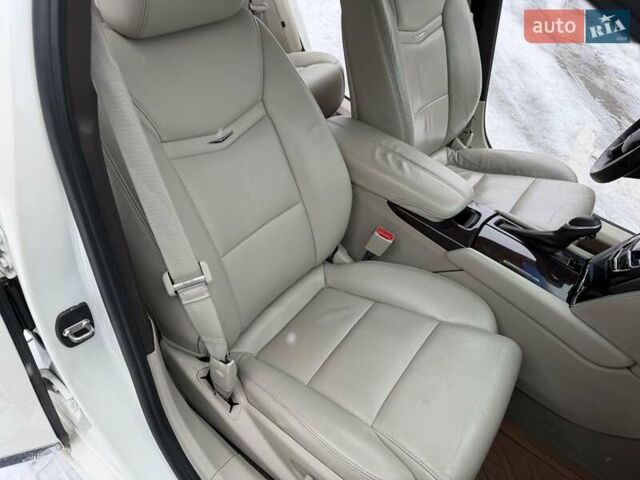 Білий Каділак ХТС, об'ємом двигуна 3.56 л та пробігом 165 тис. км за 9799 $, фото 22 на Automoto.ua