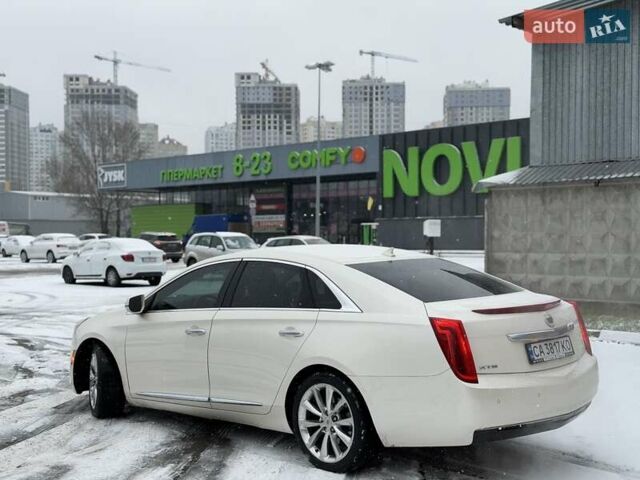 Білий Каділак ХТС, об'ємом двигуна 3.56 л та пробігом 165 тис. км за 9799 $, фото 4 на Automoto.ua