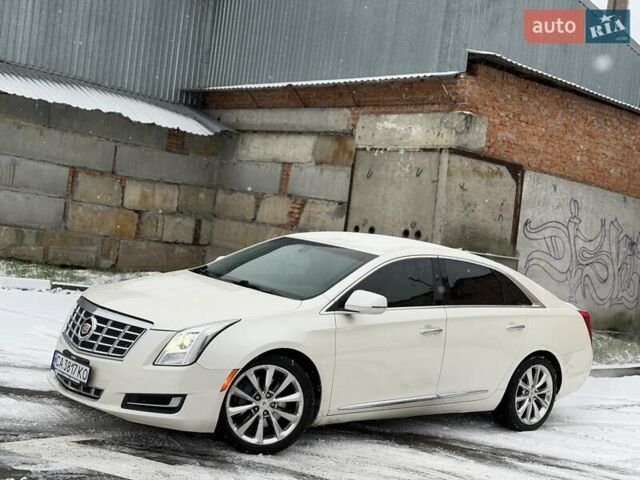 Білий Каділак ХТС, об'ємом двигуна 3.56 л та пробігом 165 тис. км за 9799 $, фото 2 на Automoto.ua