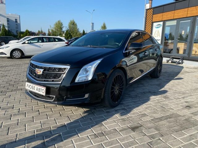 Черный Кадиллак ХТС, объемом двигателя 3.6 л и пробегом 180 тыс. км за 16600 $, фото 2 на Automoto.ua