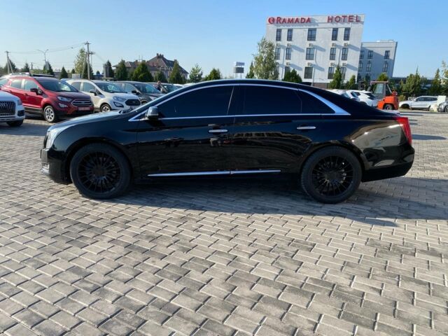 Черный Кадиллак ХТС, объемом двигателя 3.6 л и пробегом 180 тыс. км за 16600 $, фото 3 на Automoto.ua
