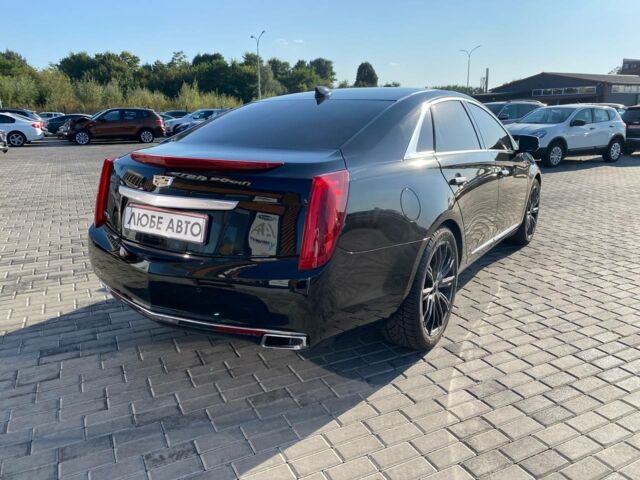 Черный Кадиллак ХТС, объемом двигателя 3.6 л и пробегом 180 тыс. км за 16600 $, фото 6 на Automoto.ua