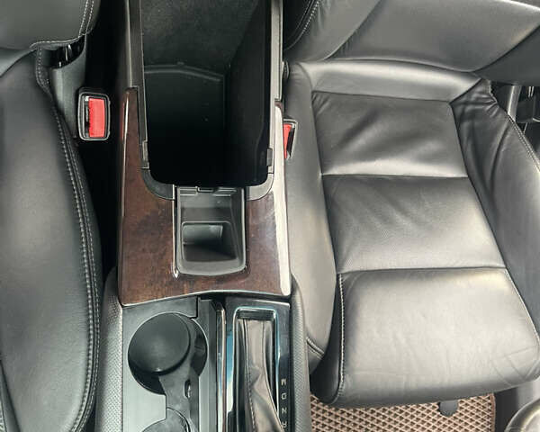 Черный Кадиллак ХТС, объемом двигателя 3.56 л и пробегом 275 тыс. км за 15600 $, фото 36 на Automoto.ua