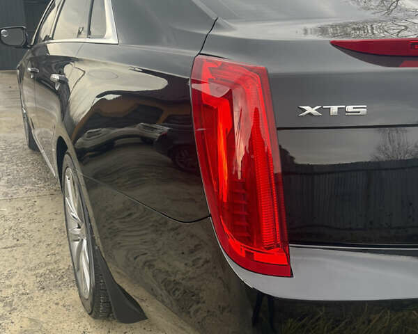 Черный Кадиллак ХТС, объемом двигателя 3.56 л и пробегом 275 тыс. км за 15600 $, фото 11 на Automoto.ua