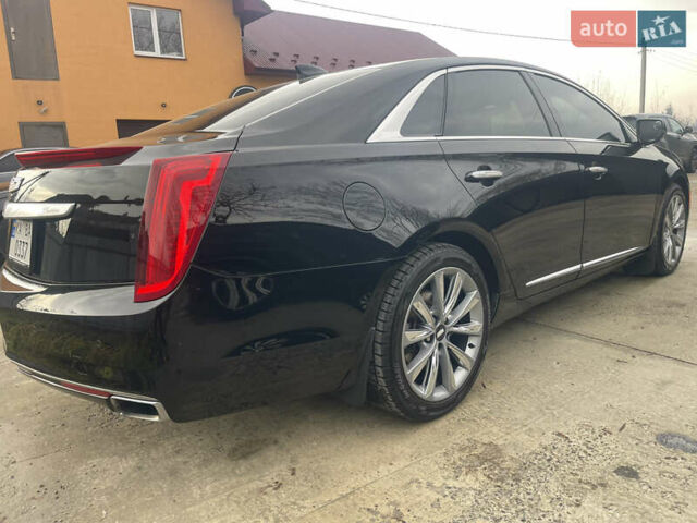 Черный Кадиллак ХТС, объемом двигателя 3.56 л и пробегом 275 тыс. км за 15600 $, фото 8 на Automoto.ua