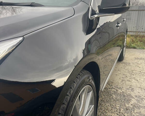 Черный Кадиллак ХТС, объемом двигателя 3.56 л и пробегом 275 тыс. км за 15600 $, фото 5 на Automoto.ua