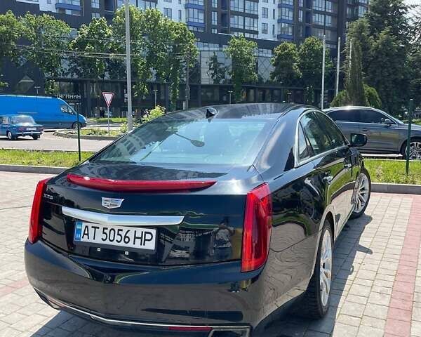 Черный Кадиллак ХТС, объемом двигателя 3.56 л и пробегом 239 тыс. км за 13100 $, фото 2 на Automoto.ua