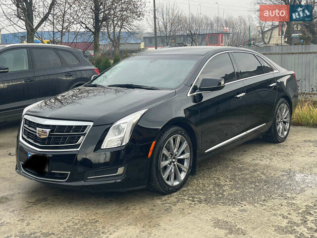 Черный Кадиллак ХТС, объемом двигателя 3.56 л и пробегом 275 тыс. км за 15600 $, фото 2 на Automoto.ua
