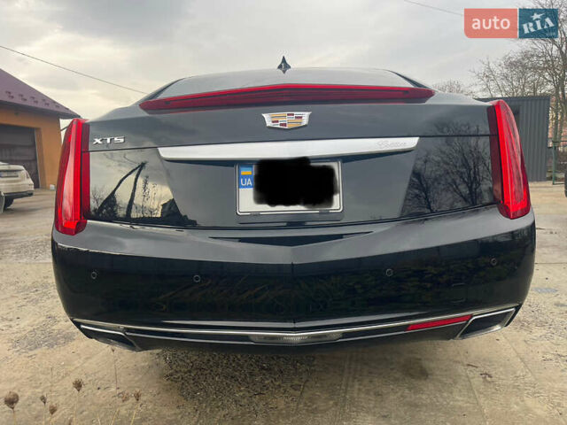 Черный Кадиллак ХТС, объемом двигателя 3.56 л и пробегом 275 тыс. км за 15600 $, фото 10 на Automoto.ua
