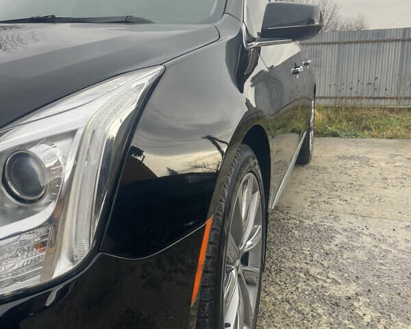 Черный Кадиллак ХТС, объемом двигателя 3.56 л и пробегом 275 тыс. км за 15600 $, фото 3 на Automoto.ua