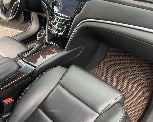 Черный Кадиллак ХТС, объемом двигателя 3.56 л и пробегом 275 тыс. км за 15600 $, фото 24 на Automoto.ua