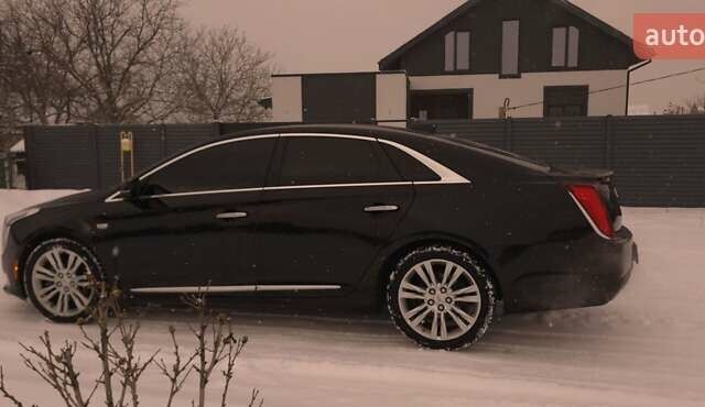 Черный Кадиллак ХТС, объемом двигателя 3.56 л и пробегом 33 тыс. км за 25000 $, фото 6 на Automoto.ua