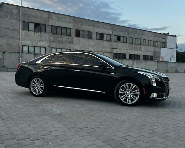 Черный Кадиллак ХТС, объемом двигателя 3.6 л и пробегом 97 тыс. км за 26500 $, фото 5 на Automoto.ua