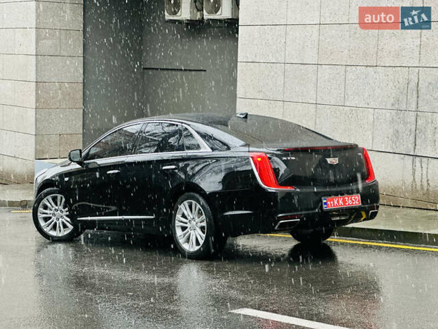 Черный Кадиллак ХТС, объемом двигателя 3.6 л и пробегом 95 тыс. км за 16999 $, фото 1 на Automoto.ua