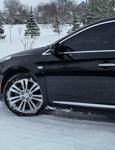 Черный Кадиллак ХТС, объемом двигателя 3.56 л и пробегом 33 тыс. км за 25000 $, фото 25 на Automoto.ua