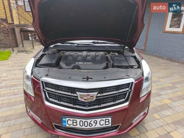 Красный Кадиллак ХТС, объемом двигателя 3.56 л и пробегом 118 тыс. км за 13500 $, фото 23 на Automoto.ua