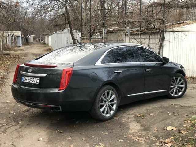 Серый Кадиллак ХТС, объемом двигателя 0 л и пробегом 203 тыс. км за 9999 $, фото 3 на Automoto.ua