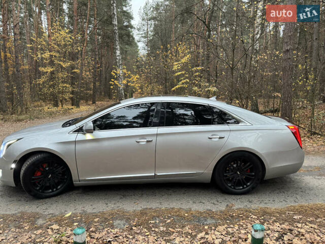 Серый Кадиллак ХТС, объемом двигателя 3.6 л и пробегом 229 тыс. км за 15900 $, фото 2 на Automoto.ua