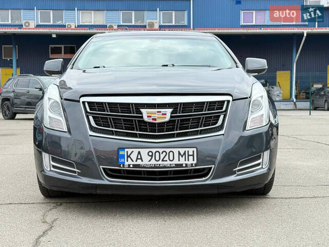 Серый Кадиллак ХТС, объемом двигателя 3.56 л и пробегом 178 тыс. км за 13000 $, фото 1 на Automoto.ua