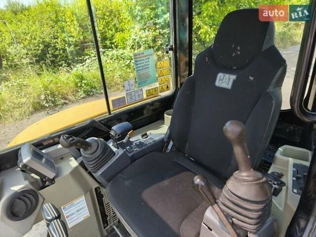 Желтый Катерпиллер 304, объемом двигателя 2.4 л и пробегом 36 тыс. км за 39736 $, фото 11 на Automoto.ua