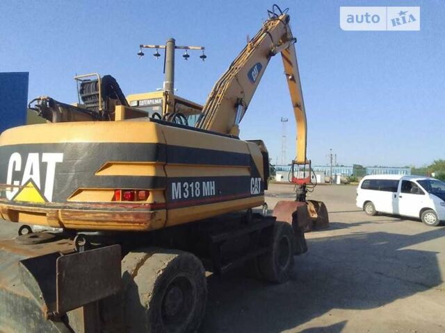 Катерпиллер 318, объемом двигателя 0 л и пробегом 103 тыс. км за 55000 $, фото 5 на Automoto.ua