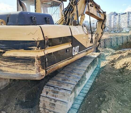 Желтый Катерпиллер 318, объемом двигателя 0 л и пробегом 13 тыс. км за 12000 $, фото 4 на Automoto.ua