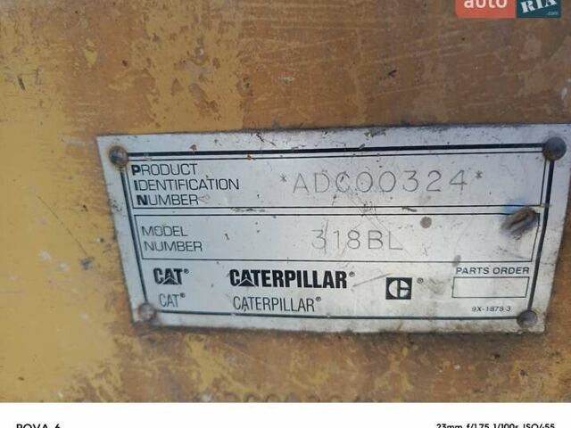 Желтый Катерпиллер 318, объемом двигателя 0 л и пробегом 13 тыс. км за 12000 $, фото 2 на Automoto.ua