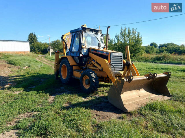 Желтый Катерпиллер 428, объемом двигателя 0 л и пробегом 500 тыс. км за 16500 $, фото 1 на Automoto.ua