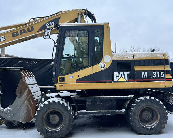 Желтый Катерпиллер M315, объемом двигателя 0 л и пробегом 200 тыс. км за 26500 $, фото 15 на Automoto.ua