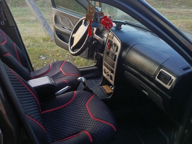 Чорний Чері Амулет, об'ємом двигуна 1.6 л та пробігом 135 тис. км за 2000 $, фото 1 на Automoto.ua