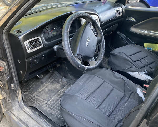 Черный Чери Амулет, объемом двигателя 1.6 л и пробегом 300 тыс. км за 1100 $, фото 7 на Automoto.ua