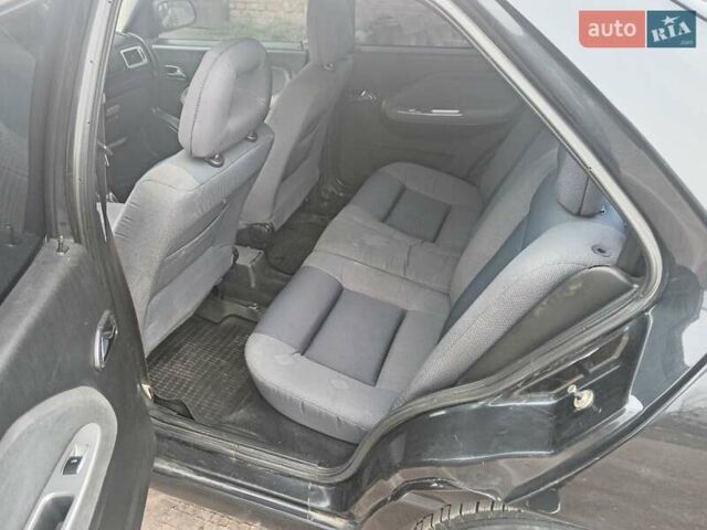 Чорний Чері Амулет, об'ємом двигуна 1.6 л та пробігом 179 тис. км за 1850 $, фото 1 на Automoto.ua