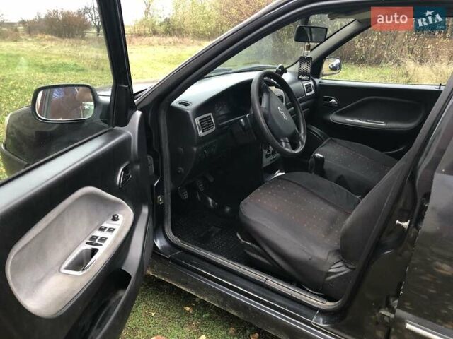 Черный Чери Амулет, объемом двигателя 1.6 л и пробегом 92 тыс. км за 2000 $, фото 6 на Automoto.ua