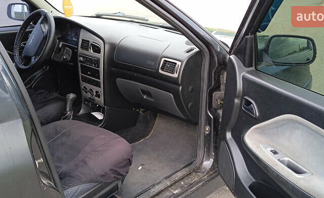 Черный Чери Амулет, объемом двигателя 1.6 л и пробегом 93 тыс. км за 1750 $, фото 4 на Automoto.ua