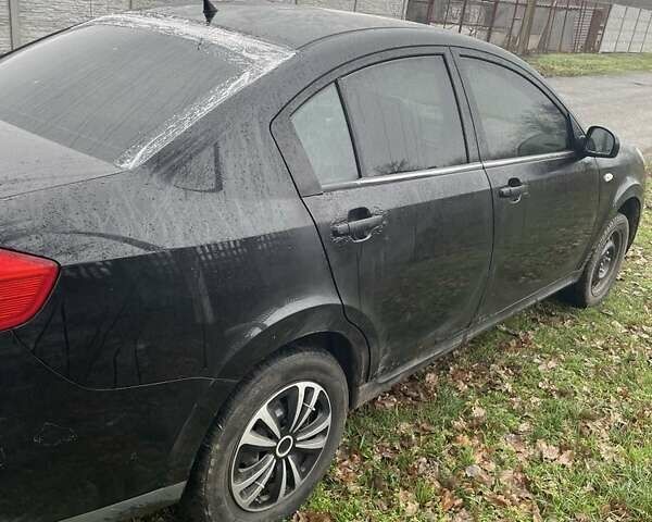 Черный Чери Е5, объемом двигателя 1.5 л и пробегом 200 тыс. км за 1800 $, фото 2 на Automoto.ua