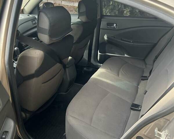 Коричневый Чери Е5, объемом двигателя 1.5 л и пробегом 203 тыс. км за 4000 $, фото 6 на Automoto.ua