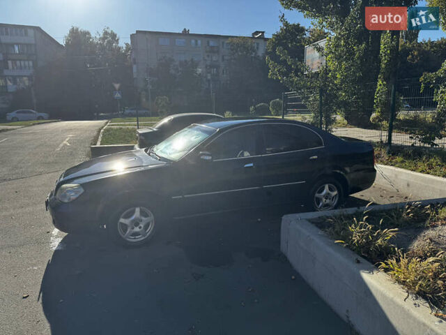 Чорний Чері Істар, об'ємом двигуна 2 л та пробігом 178 тис. км за 2499 $, фото 3 на Automoto.ua