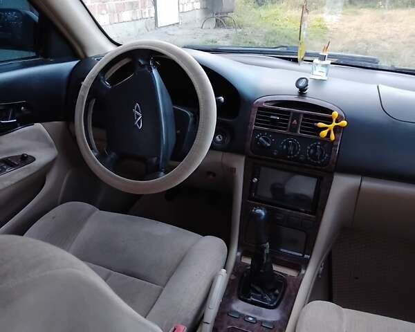 Черный Чери Истар, объемом двигателя 2 л и пробегом 350 тыс. км за 2100 $, фото 7 на Automoto.ua