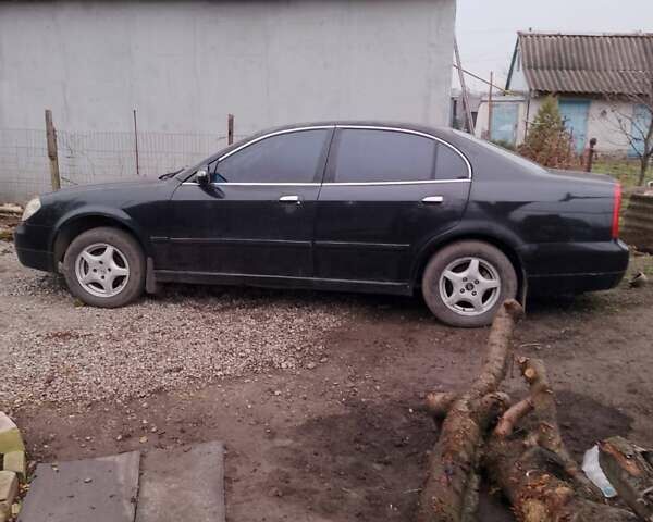 Черный Чери Истар, объемом двигателя 2 л и пробегом 230 тыс. км за 799 $, фото 2 на Automoto.ua